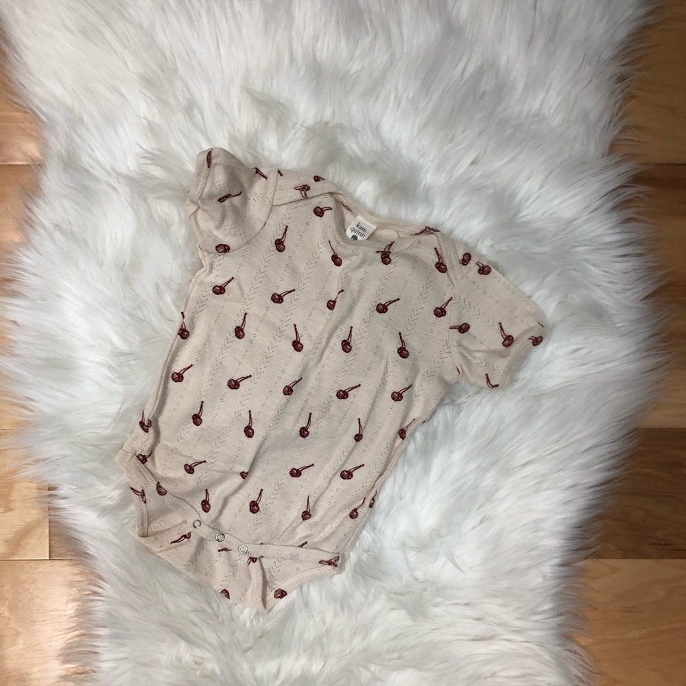 Kate Quinn organic cotton pointelle cherry onesie